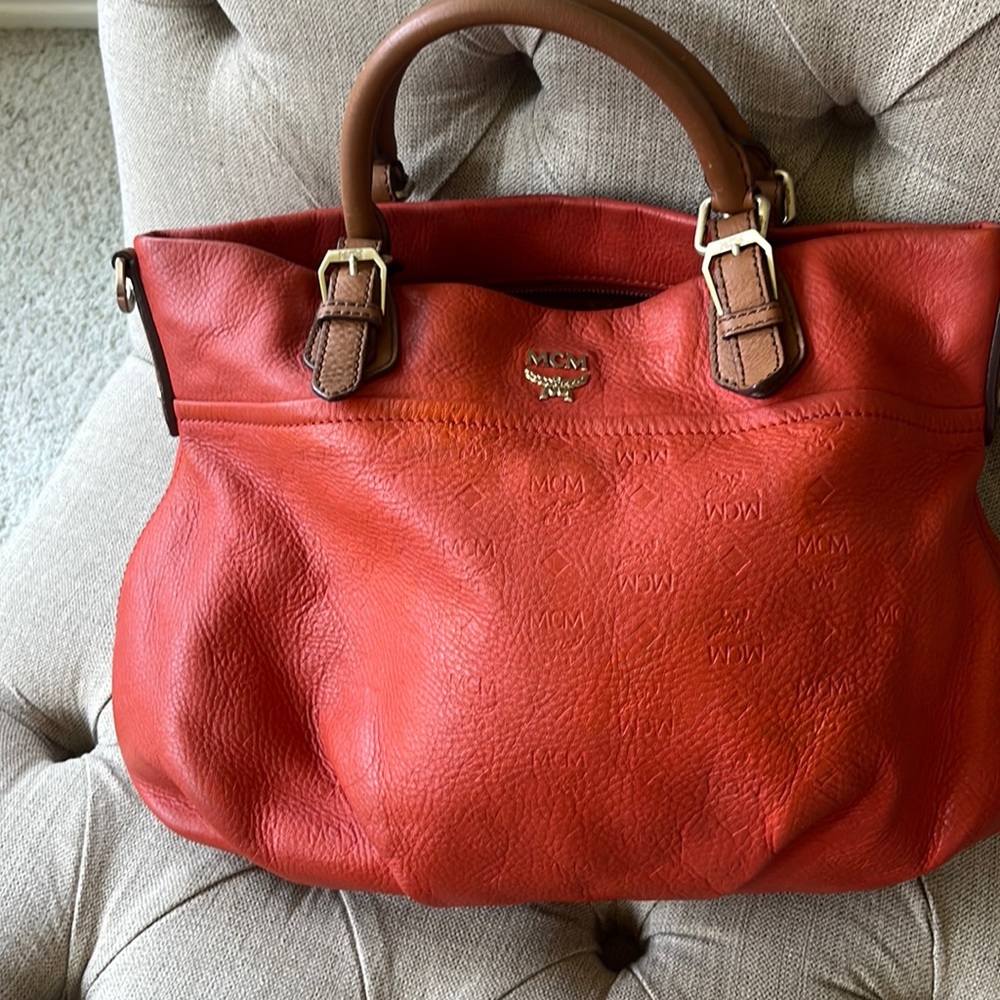 Beautiful MCM orange leather bag. Authentic with white tag.